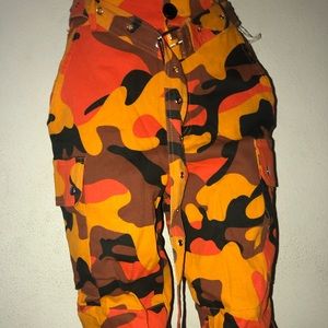 Red orange, orange, and black cargo pants